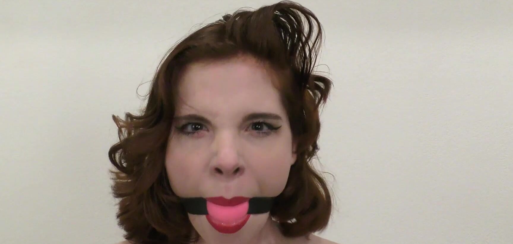 "DandyinDistress" ballgagged, bdsm, bondage, redhead, vibrator femme fatale caught and vibed manyvids