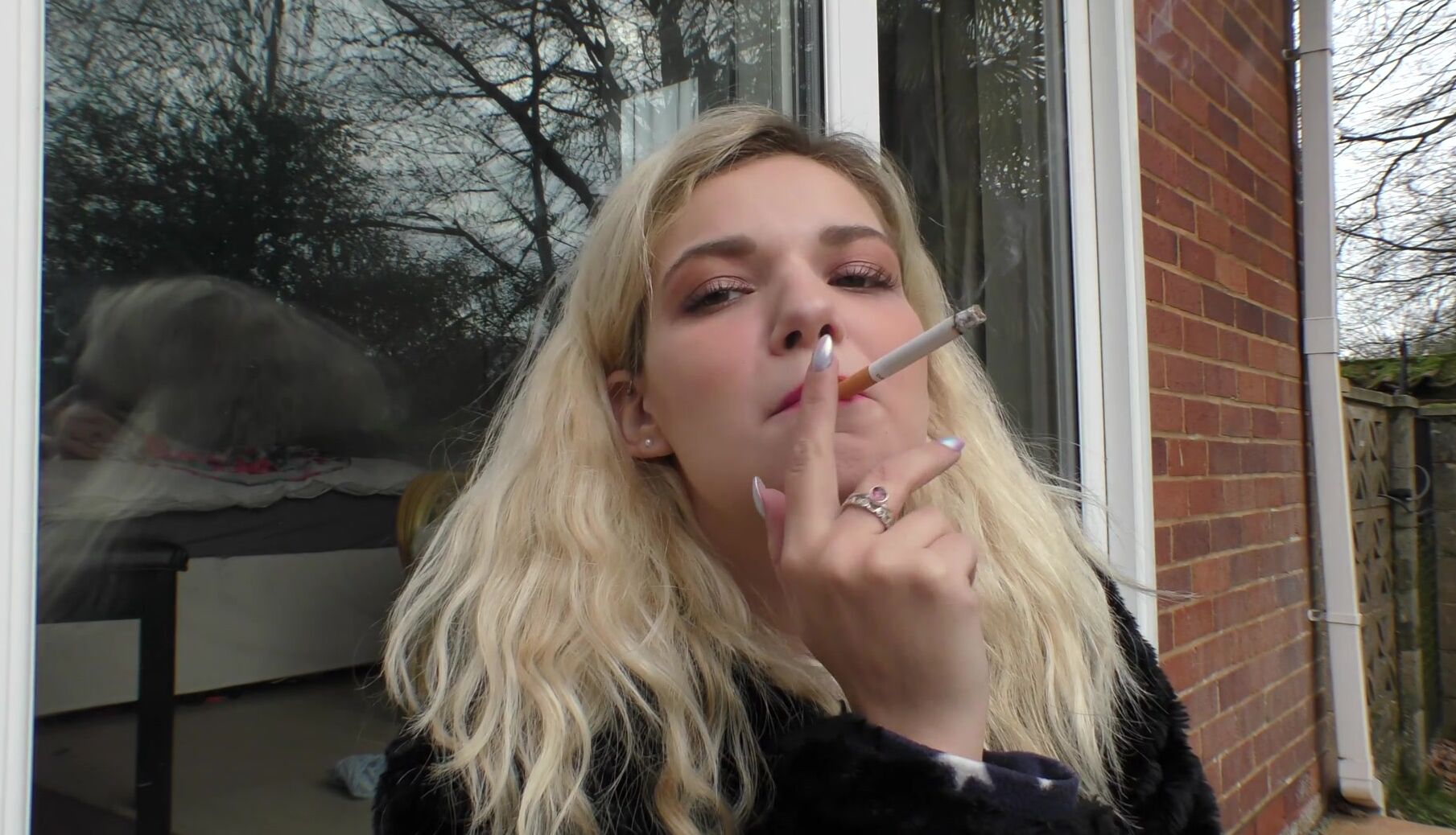 Bad Dolly Smoking On A Cold Day