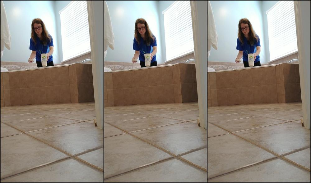 Kinky Little Sub Cleaning A Bathtub