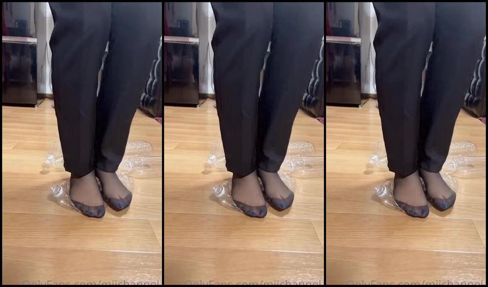 Miichannel R Nicknamed Miichannel R Onlyfans A Woman In A Pantsuit Tramples A Bottle 1