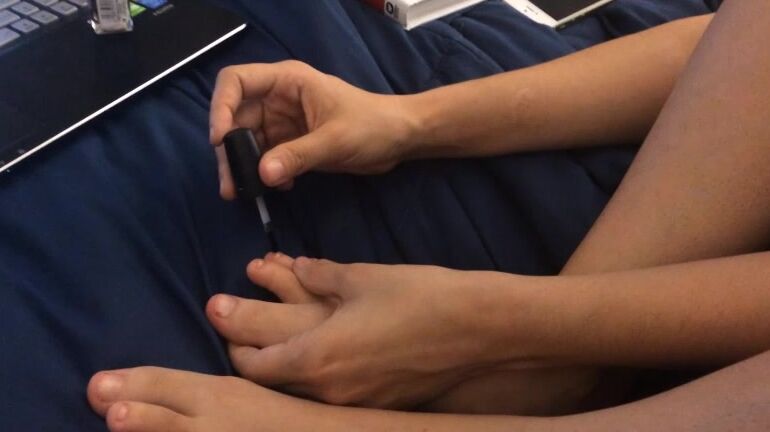 Painting Toes Metallic Red Close Up Feet