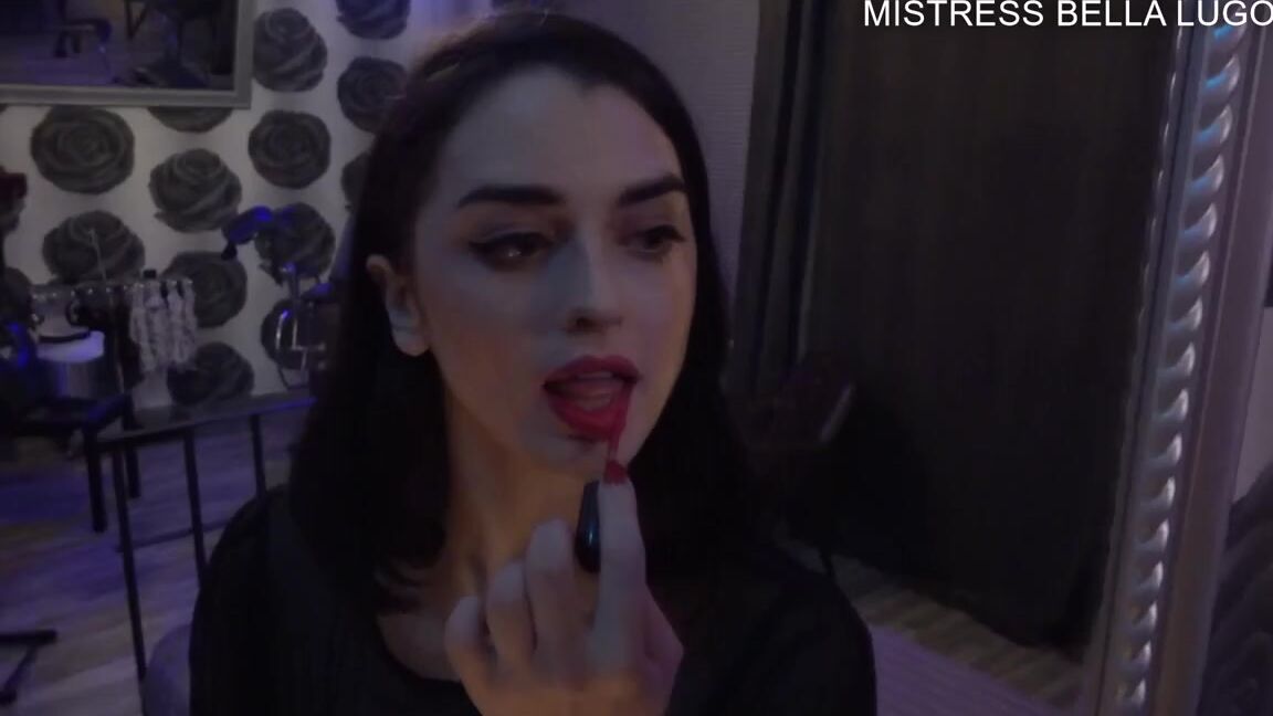 Mistress Bella Lugosi Nicknamed Missbellalugosi Onlyfans Mistress Sensually Applies Her Signature Color Called Feels So Grand In The Mirror Of The Dimly