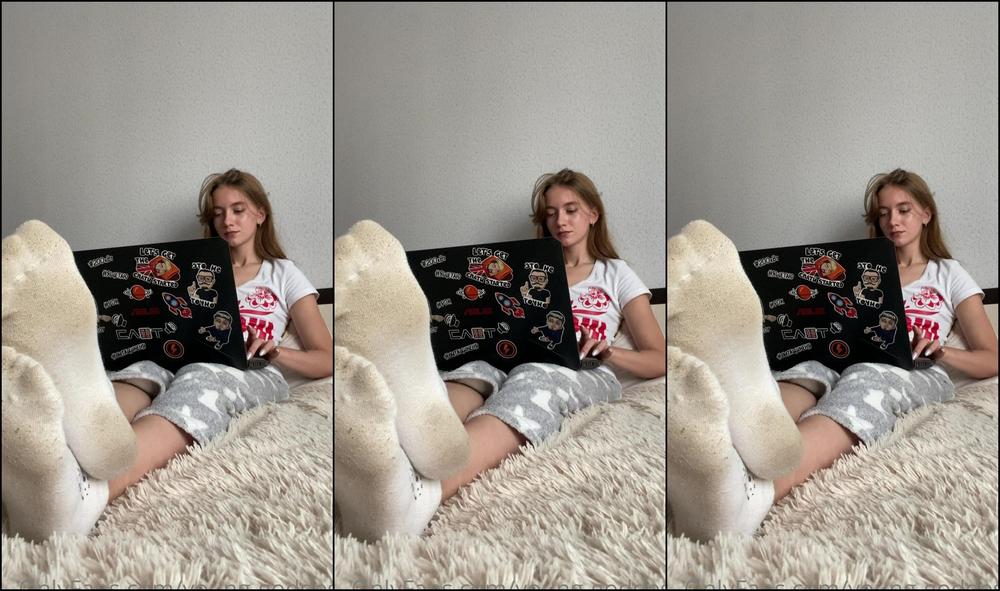 Young Goddess Doing Work While You Admire My Feet