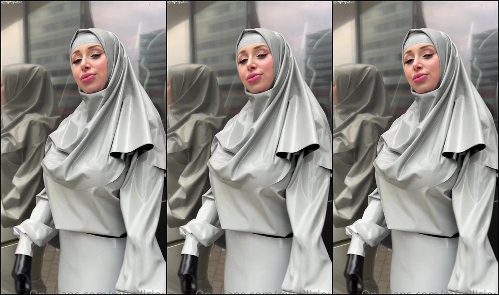 Mfetilicious Wearing Light Grey Latex By Sebastian Cauchos In Amsterdam With A Black Catsuit Underneat