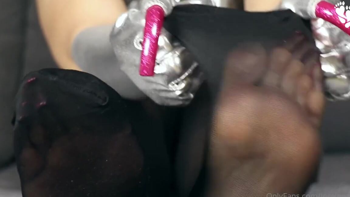 Lora Long Nails Nicknamed Loralongnails Onlyfans Wearing Silver Gloves And Black Stockings