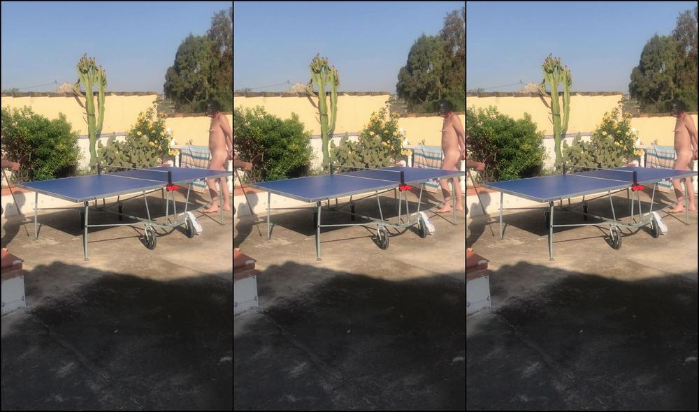 Lady Dark Angel Naked Hooded And Collared Table Tennis In The Sun