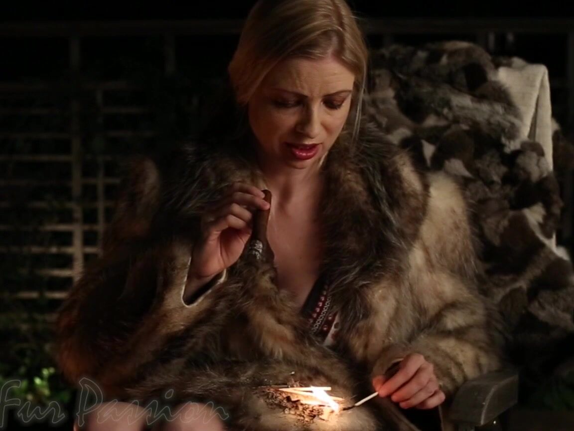 Kaitlink Burning A Fur Coat While Wearing It