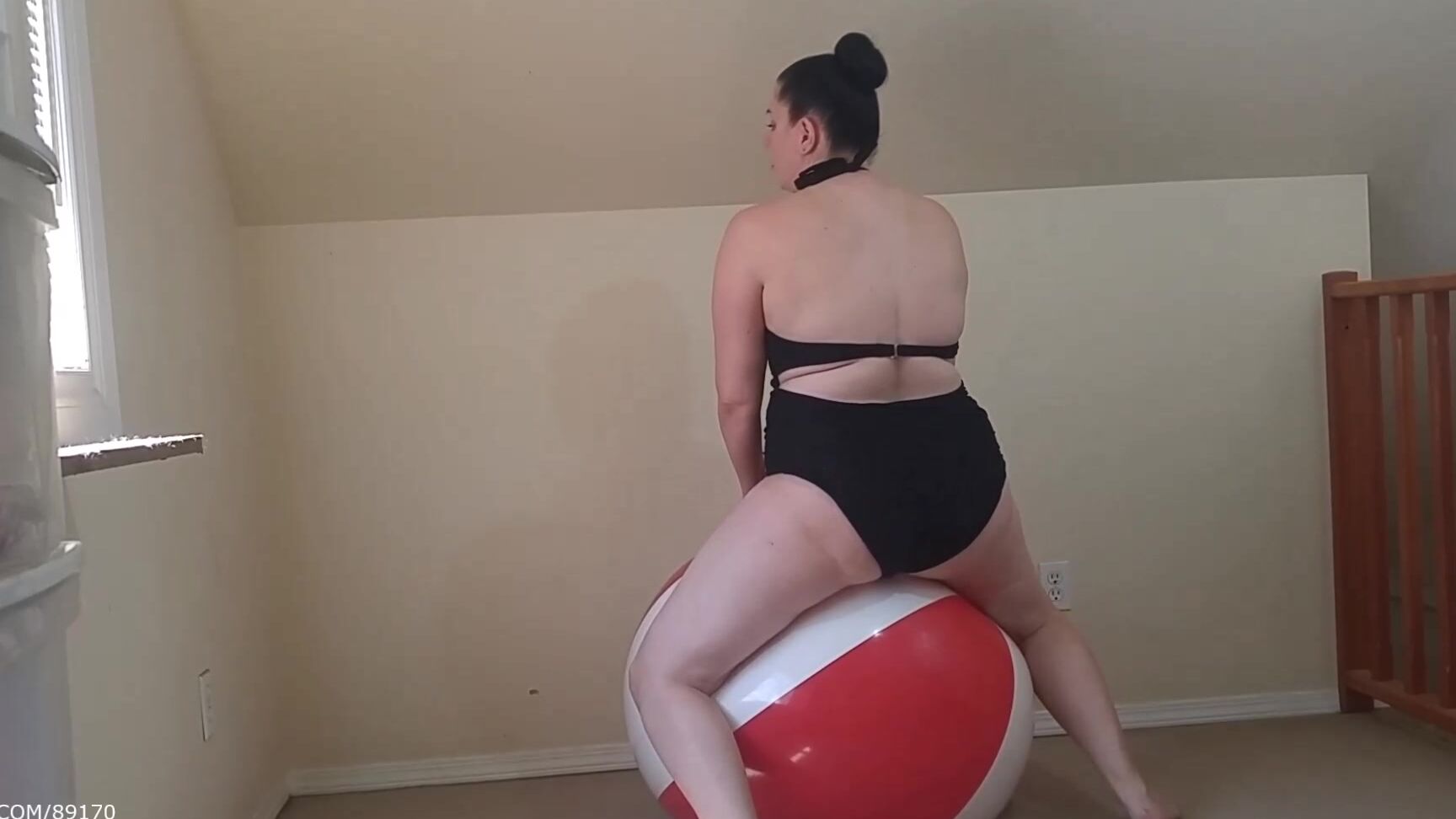Booty U Black Bathingsuit And Big Beach Ball