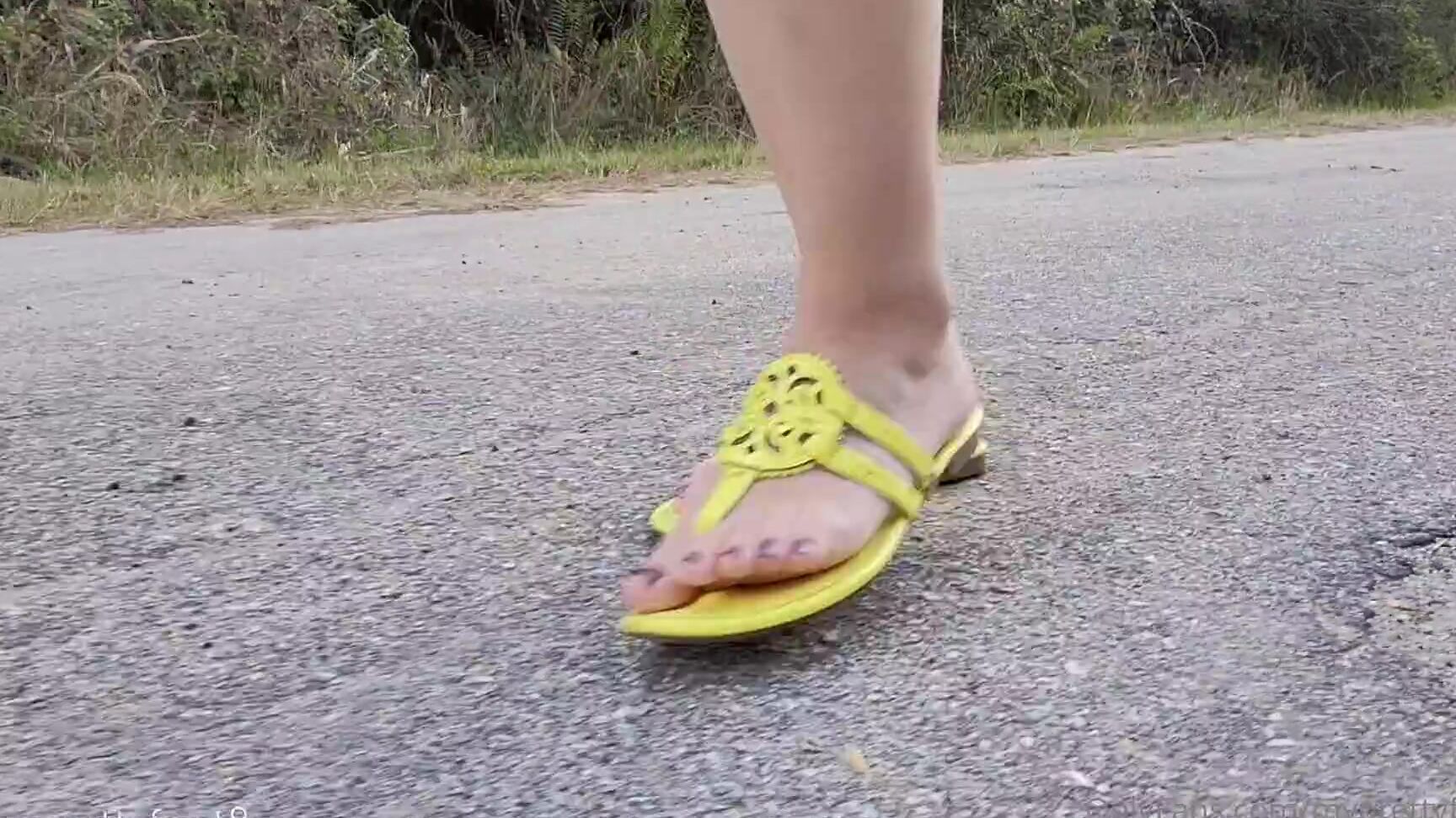 Myprettyfeet Walking In Yellow Flip Flops Just Strolling Along An Empty Road While The Camera Watches M