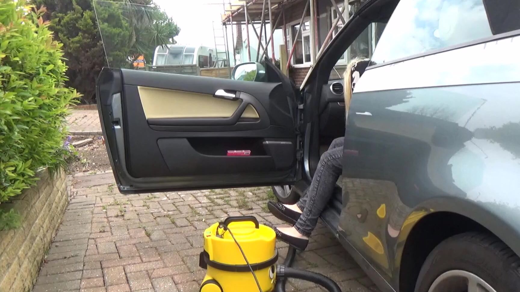 Penny Lee Vacumming The Car