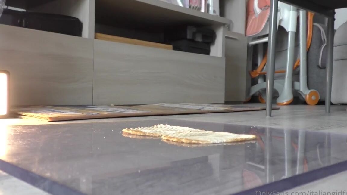 Italian Girlfriend Nicknamed Italiangirlfriend 07 14 2022 Onlyfans Video Leather Green Wedges Against Some Bread And Some Chocolate Eggs