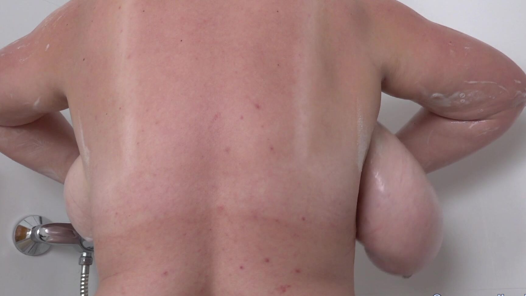 Micky Bells flaunts her natural milf tits in a sensual solo bathroom tease